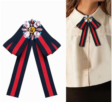 gucci bow tie brooch|gucci brooch outfit.